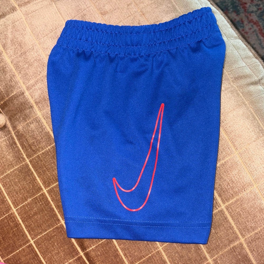 Nike Kids Blue Shorts with Red Swoosh